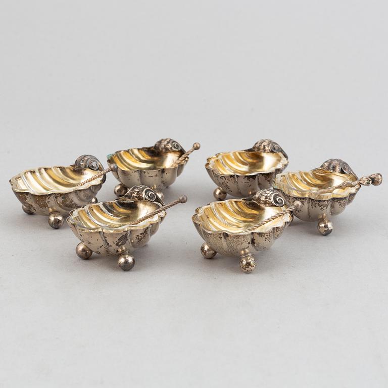 A set of six German parcel-gilt silver 800 salt cellars in fitted case.