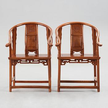 A pair of horseshoe-back armchairs, Qing dynasty (1644-1912).