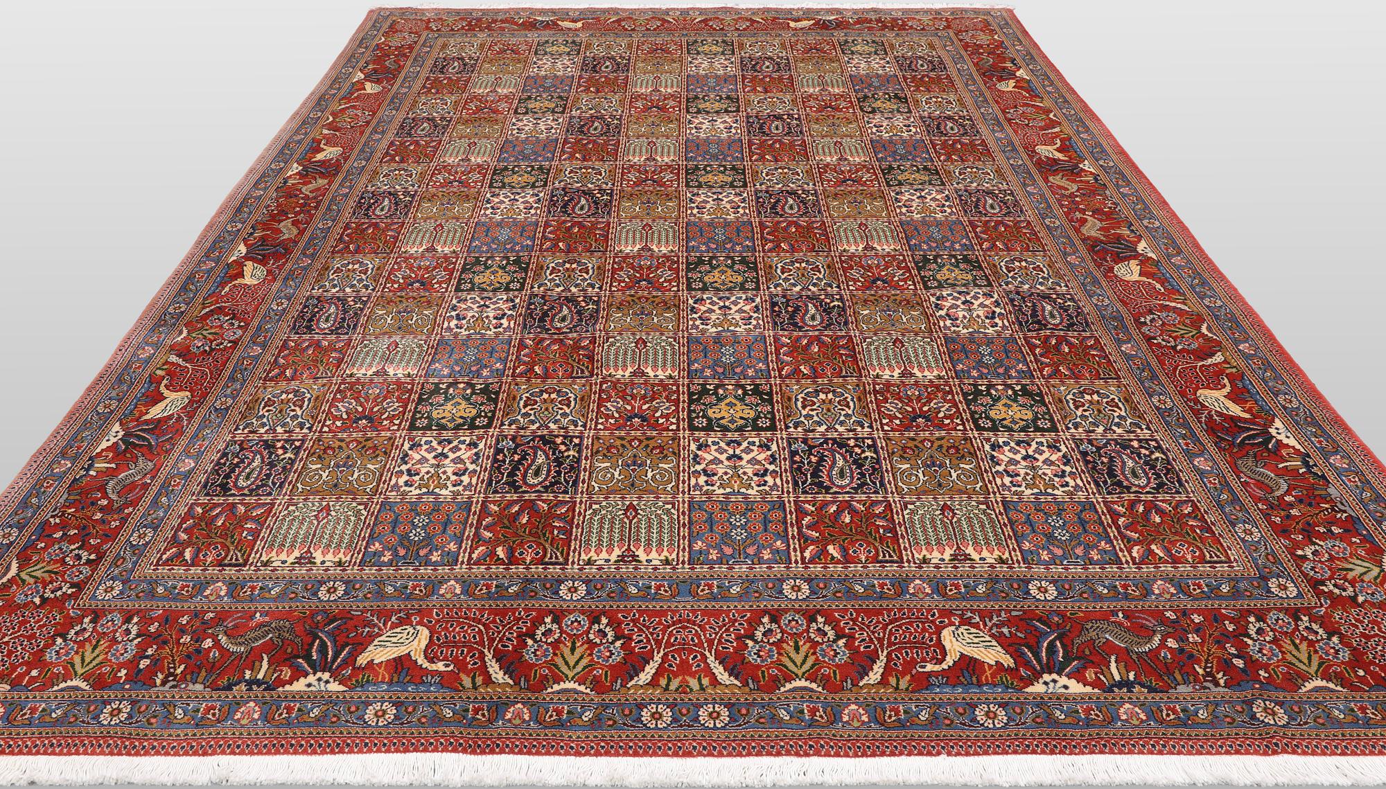 A Moud part silk carpet, 354 x 252 cm.