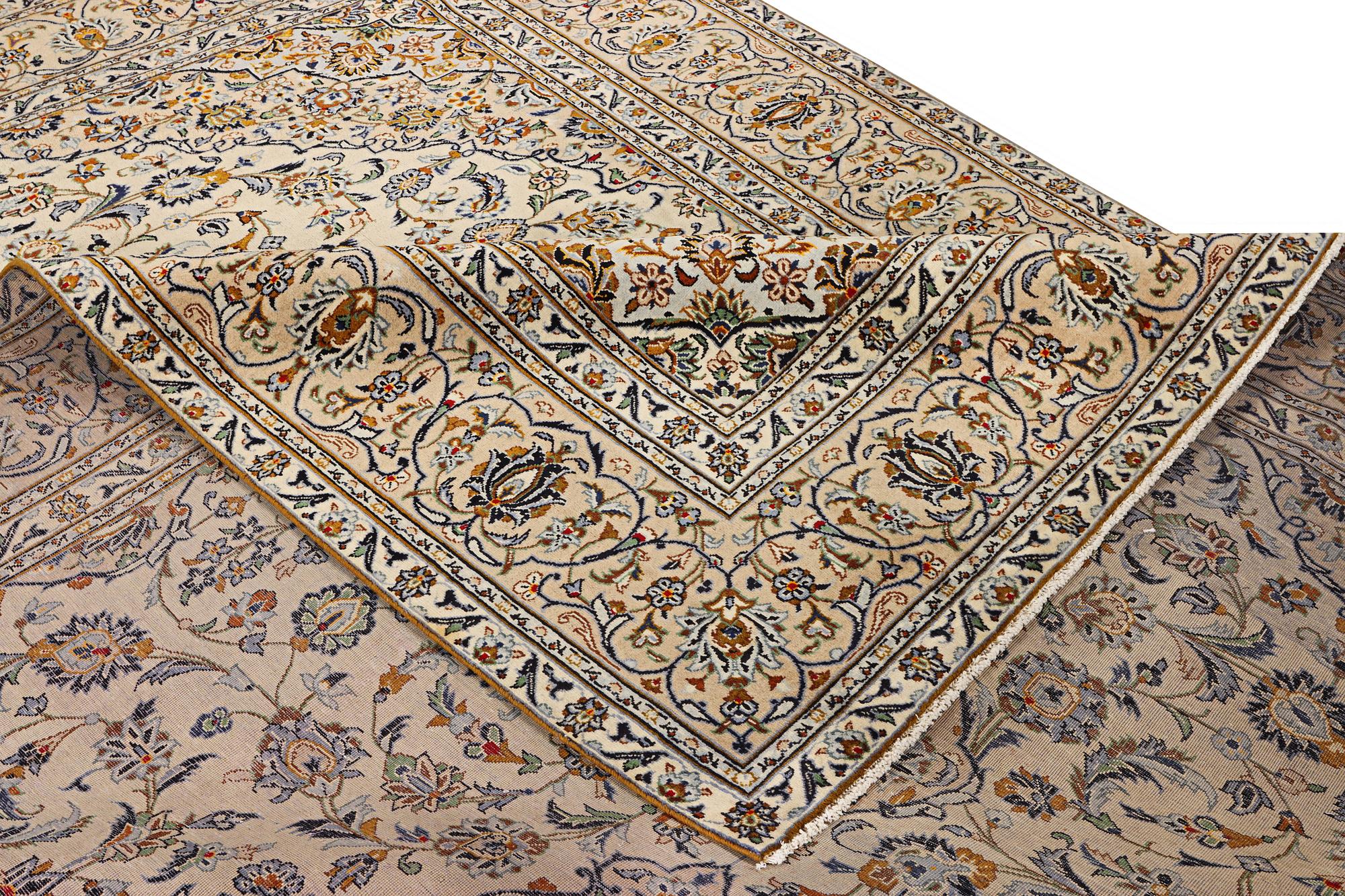 A Kashan carpet, c. 388 x 285 cm.