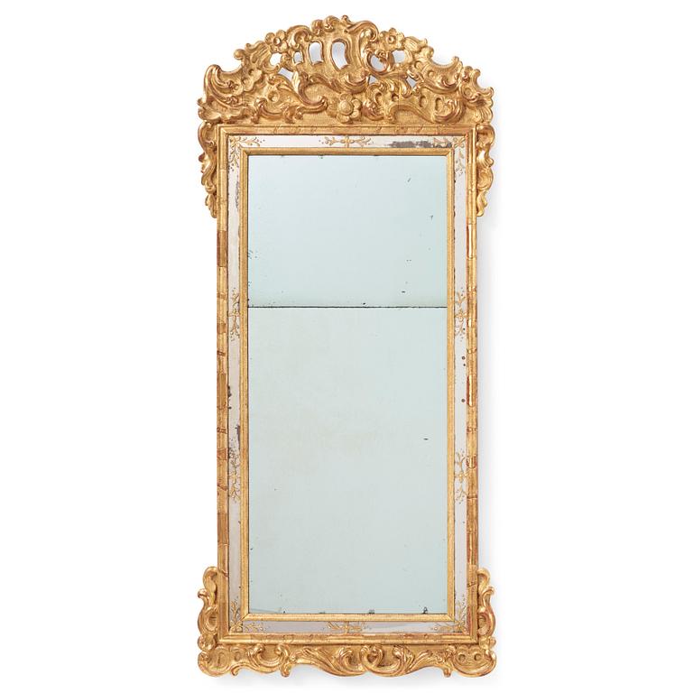 A Swedish late Baroque giltwood mirror by Busch & Echtler (mirror and lacquer manufactory in Gothenburg 1747-1802).