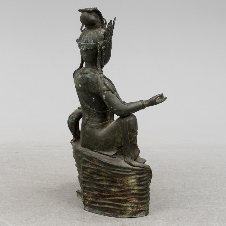 A mid 20th century metal Guan Yin figurine, China.