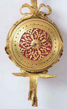 A French Louis XVI-style gilt-bronze cartel clock, 19th century.