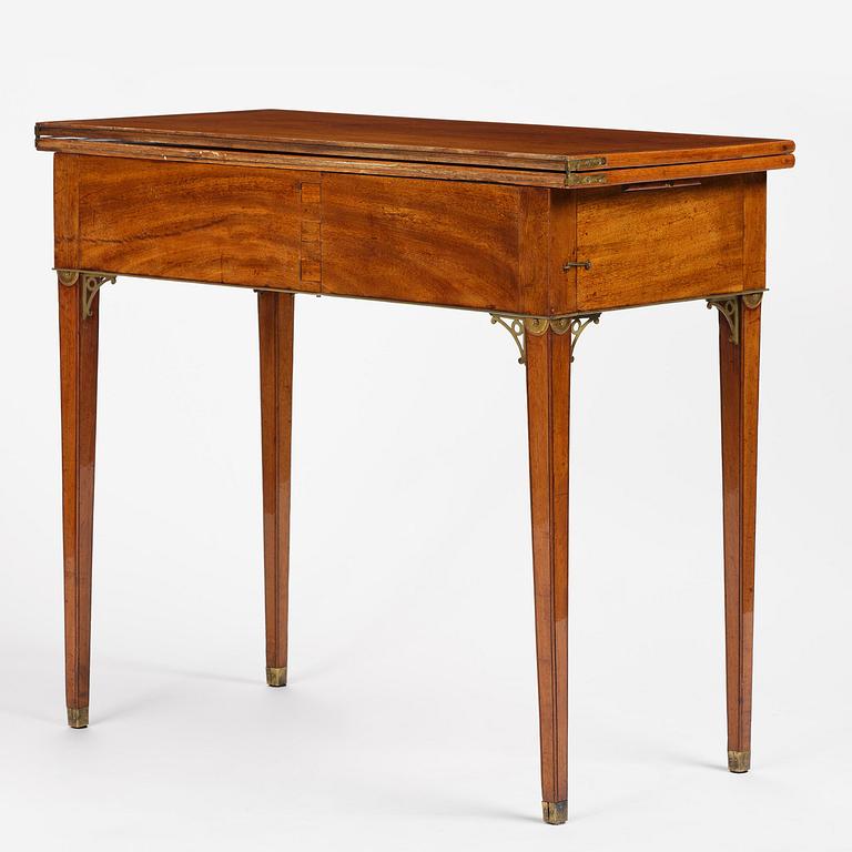 A late Gustavian mahogany games table, presumably by A. Nordström (Journeyman at G. Iwersson 1806-09).