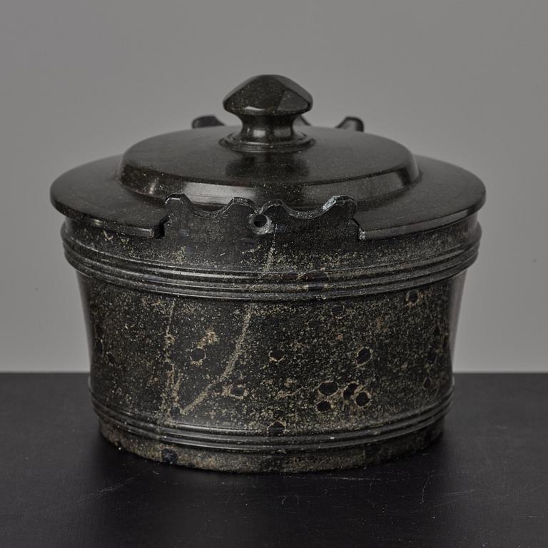 A serpentine stone butter box and cover circa 1800.