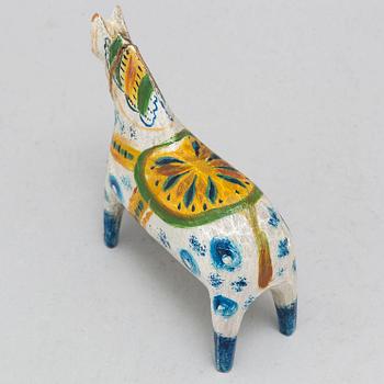 A painted Swedish wooden horse from the early 20th century.