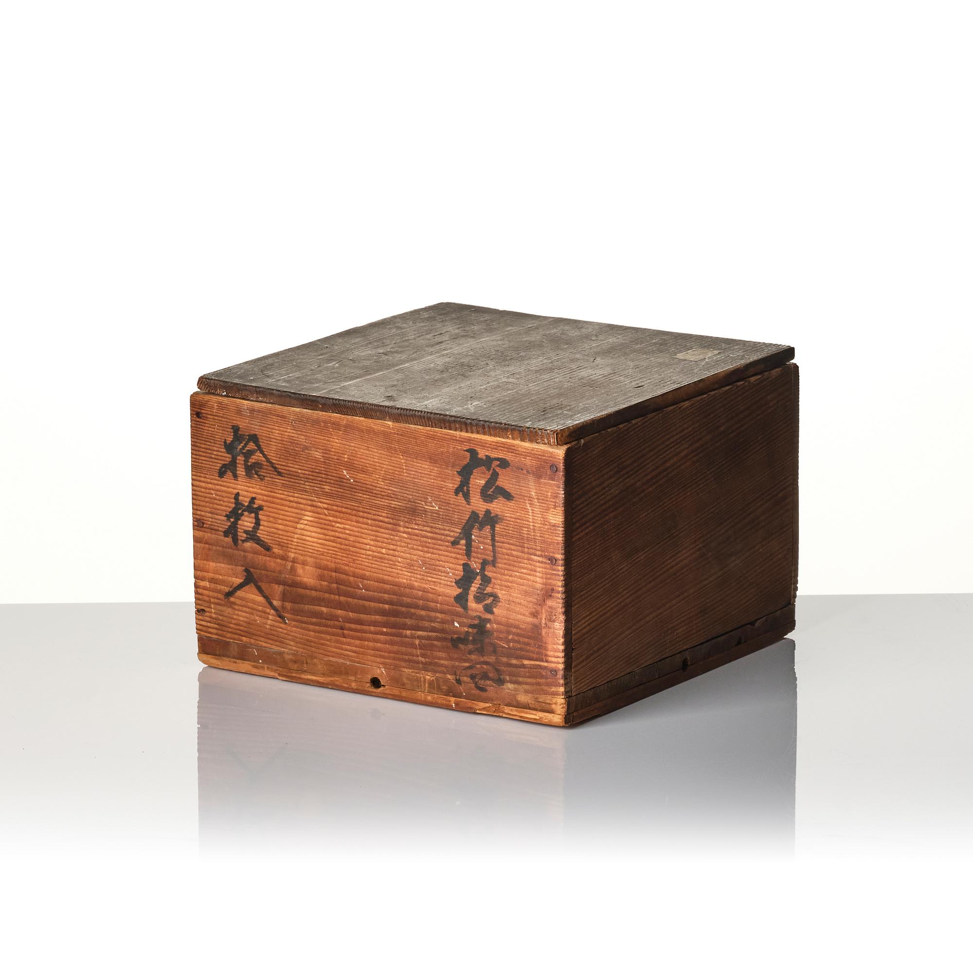 A Japanese lacquer tray and three Japanse wooden boxes.