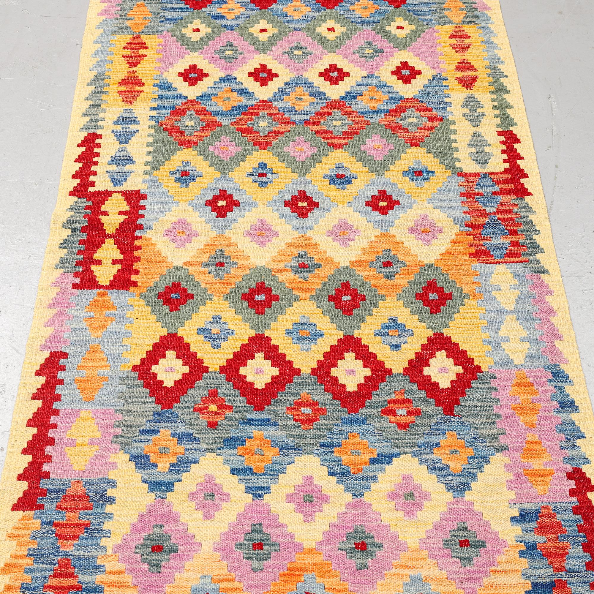 A runner, kilim 300 x 88 cm.