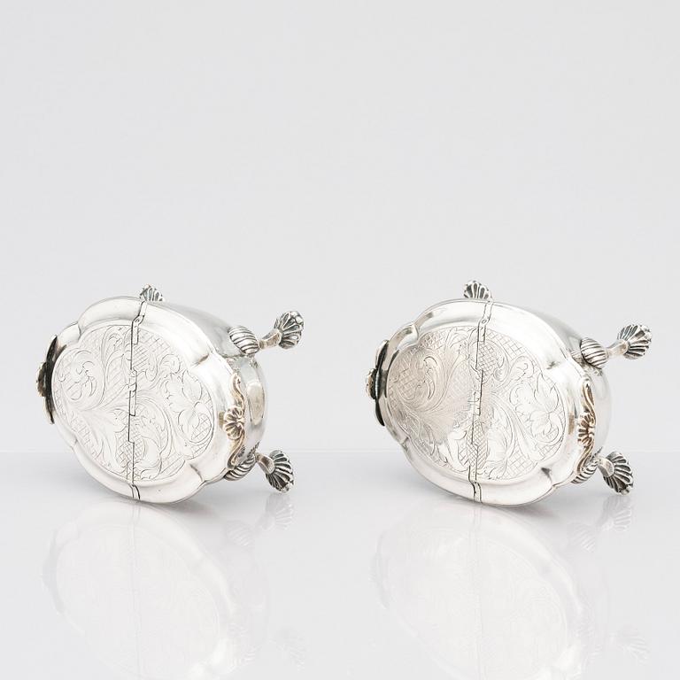 A pair of Latvian Rococo silver salt and pepper stands, marks of Johan Christian Henck (Henke), Riga 1768-80.