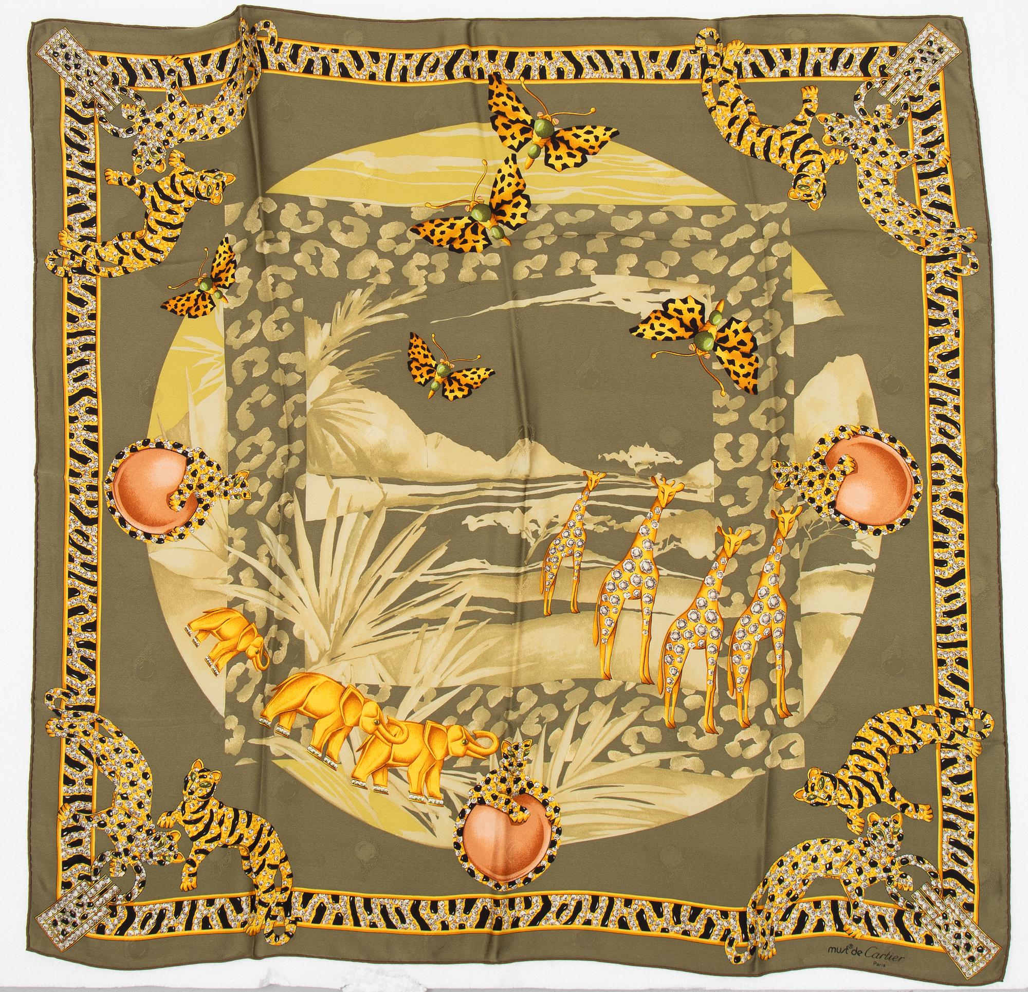 Cartier, a jaquard silk scarf.