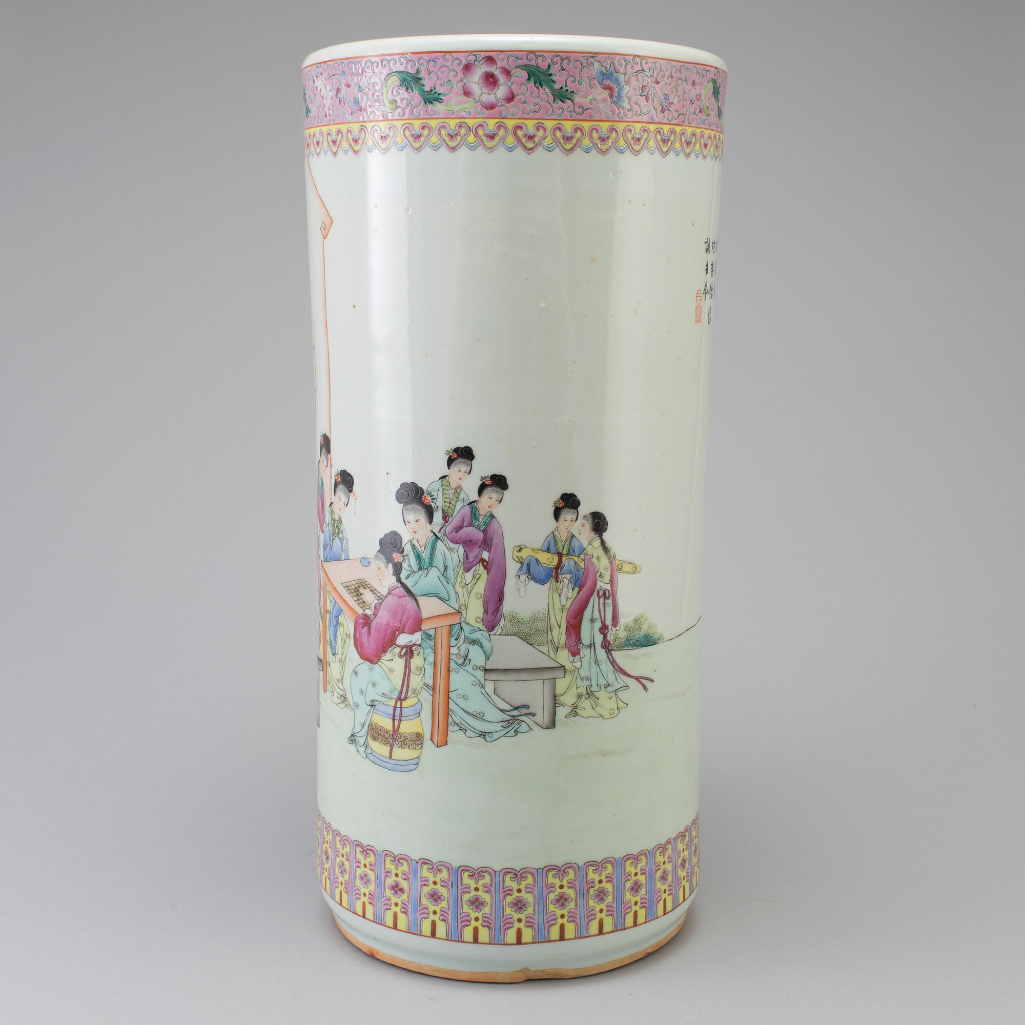 A 20th century porcelain umbrella stand.