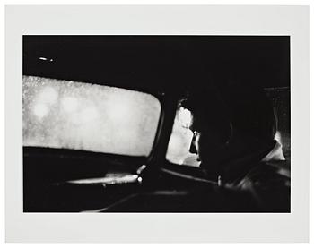 Larry Clark, "Untitled (man in car with view of rainy night)", 1963.