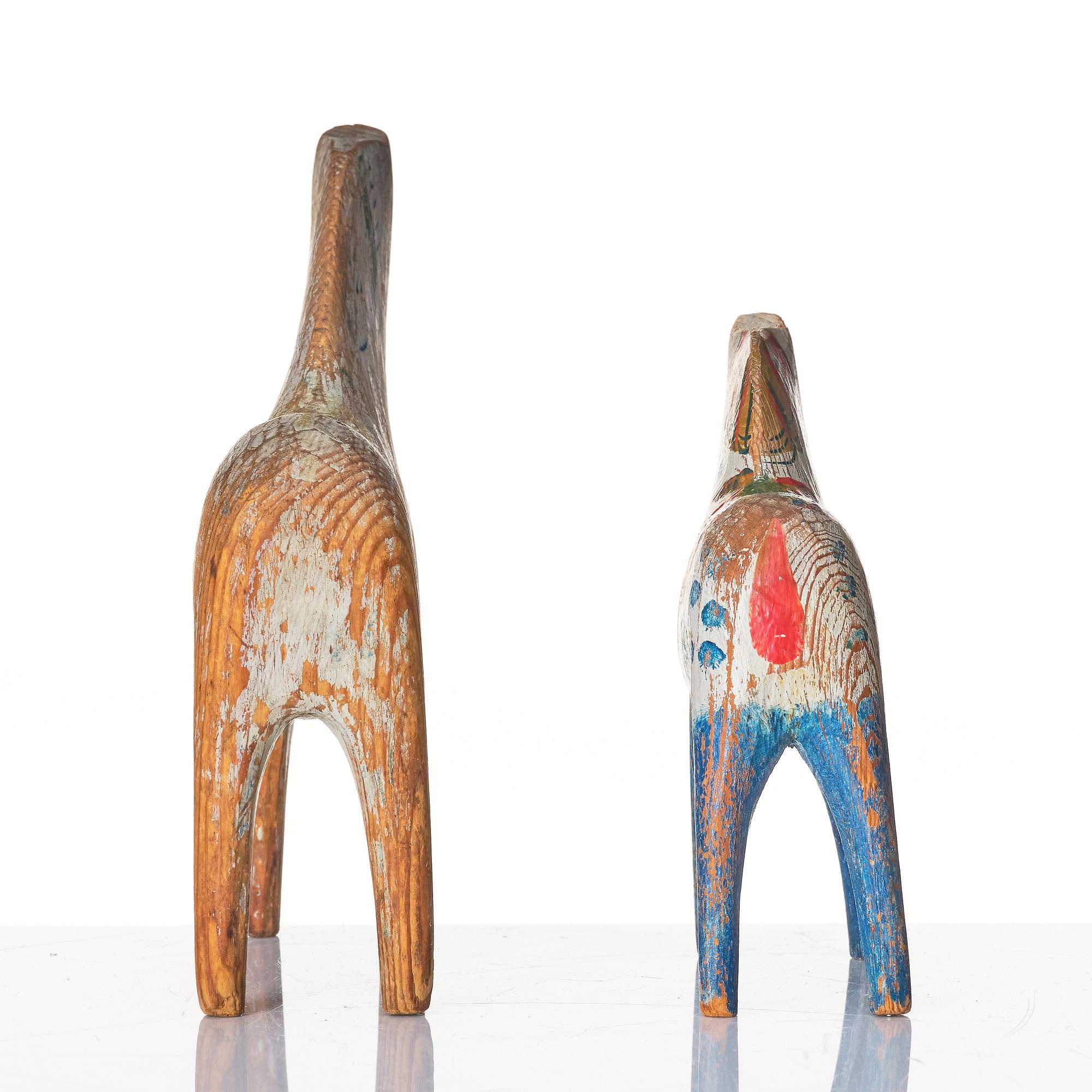 Two Swedish "Dala horses", first half of the 20th century.
