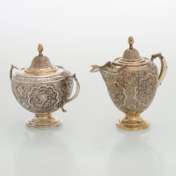 A 5-piece Persian tea service, first half of the 20th century.