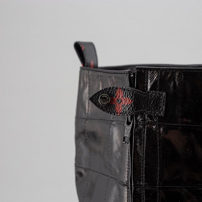 LOUIS VUITTON, a pair of letaher boots, size 37.