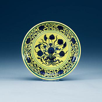 A yellow glazed blue and white lotus dish, mark and period of Yongzheng (1723-35).