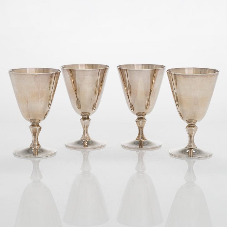 A set of four 1960s sterling silver beakers, maker's mark of Poston Products Ltd, Birmingham, 1969.