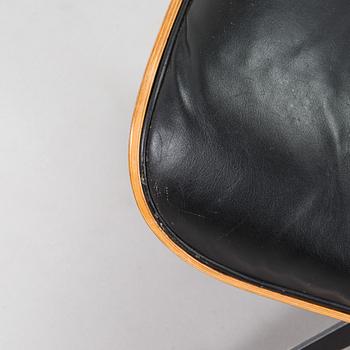 Charles and Ray Eames, a 1960s 'Lounge chair' and stool for Herman Miller.