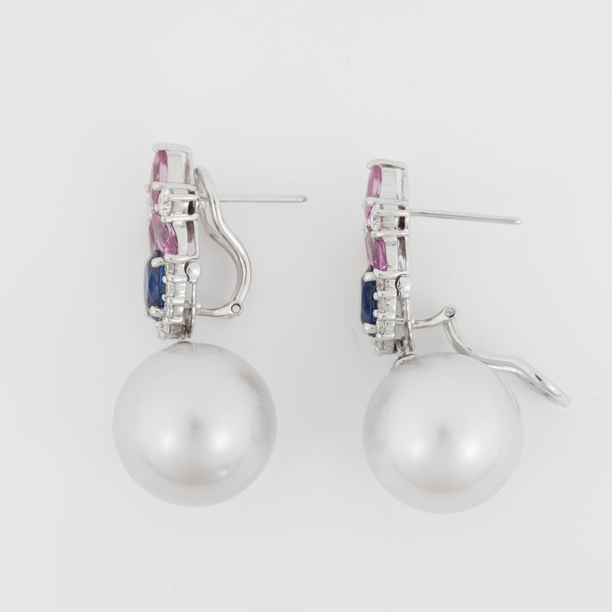 A pair of cultured South Sea pearl, sapphire and diamond earrings.