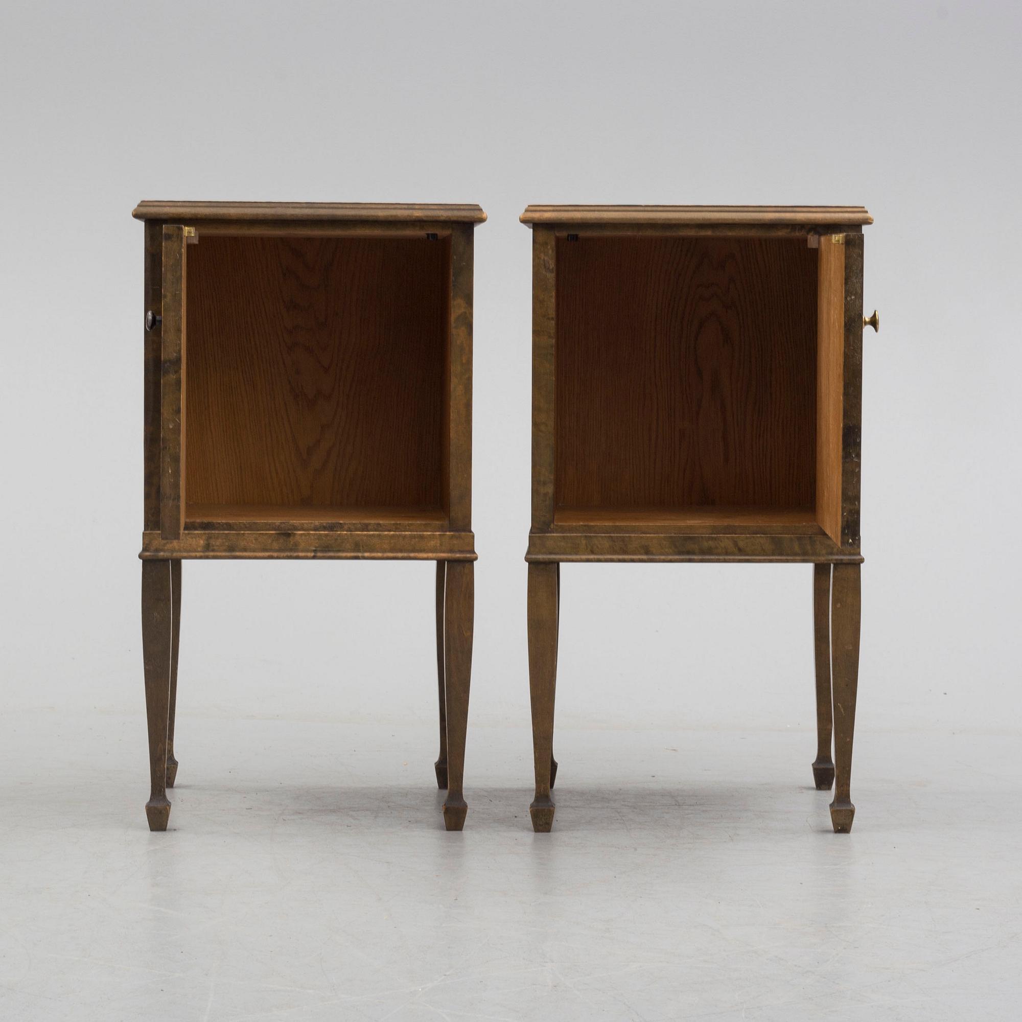 a pair of Art Déco bedside tables.