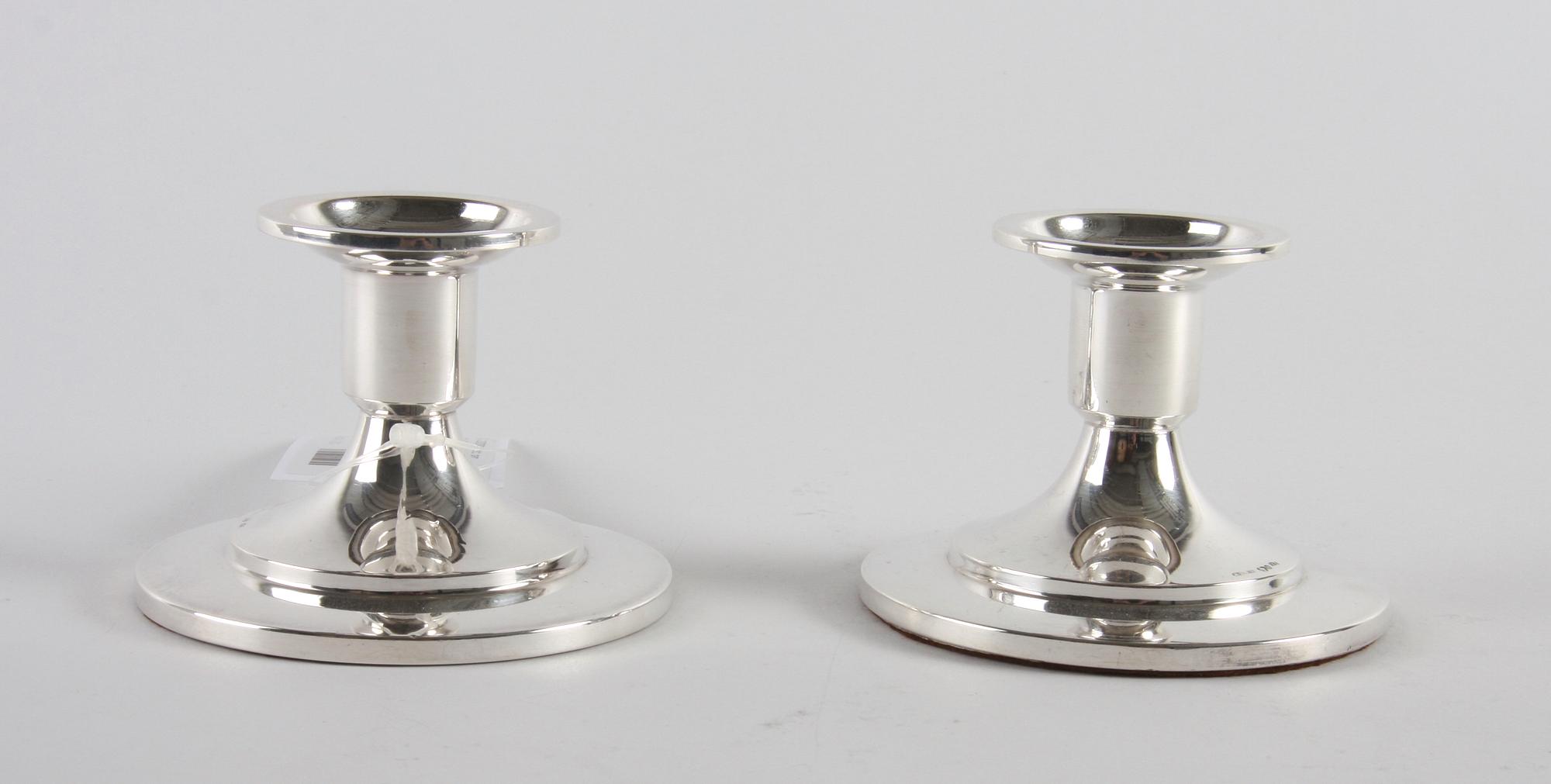 LJUSSTAKAR, ett par, silver, 1938.