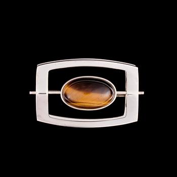 ARMSMYCKE, RING och BROSCH, silver, tigeröga. Åbo, 1960-70. Vikt totalt ca 39,7 g.