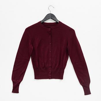 Alaïa, a burgundy wool twin set with cardigan and top, French size 38.