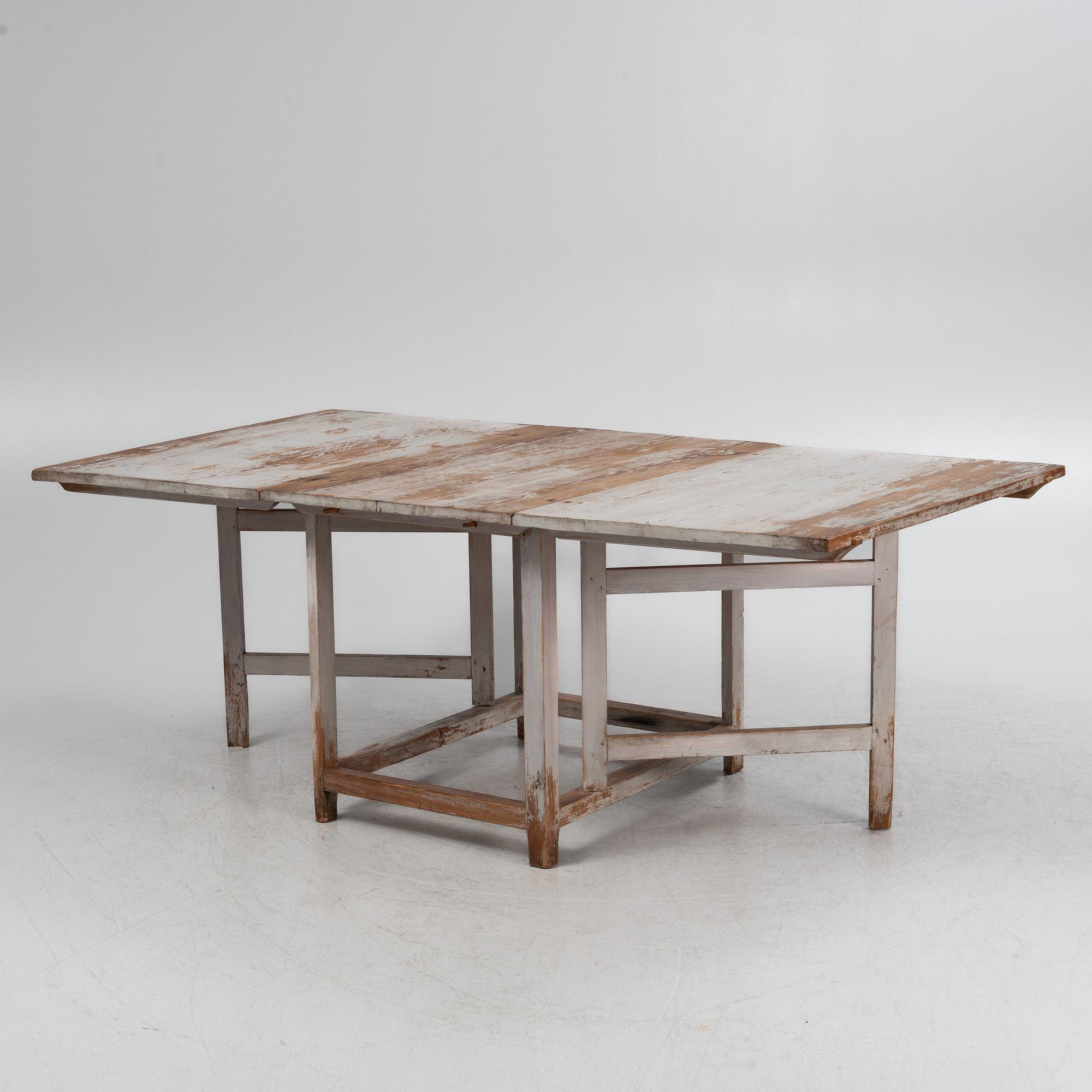 A painted gate leg table, 19th Century.