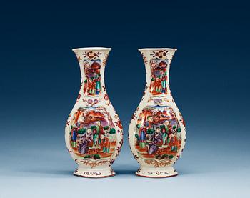 1606. A pair of famille rose vases, Qing dynasty, Qianlong (1736-95).