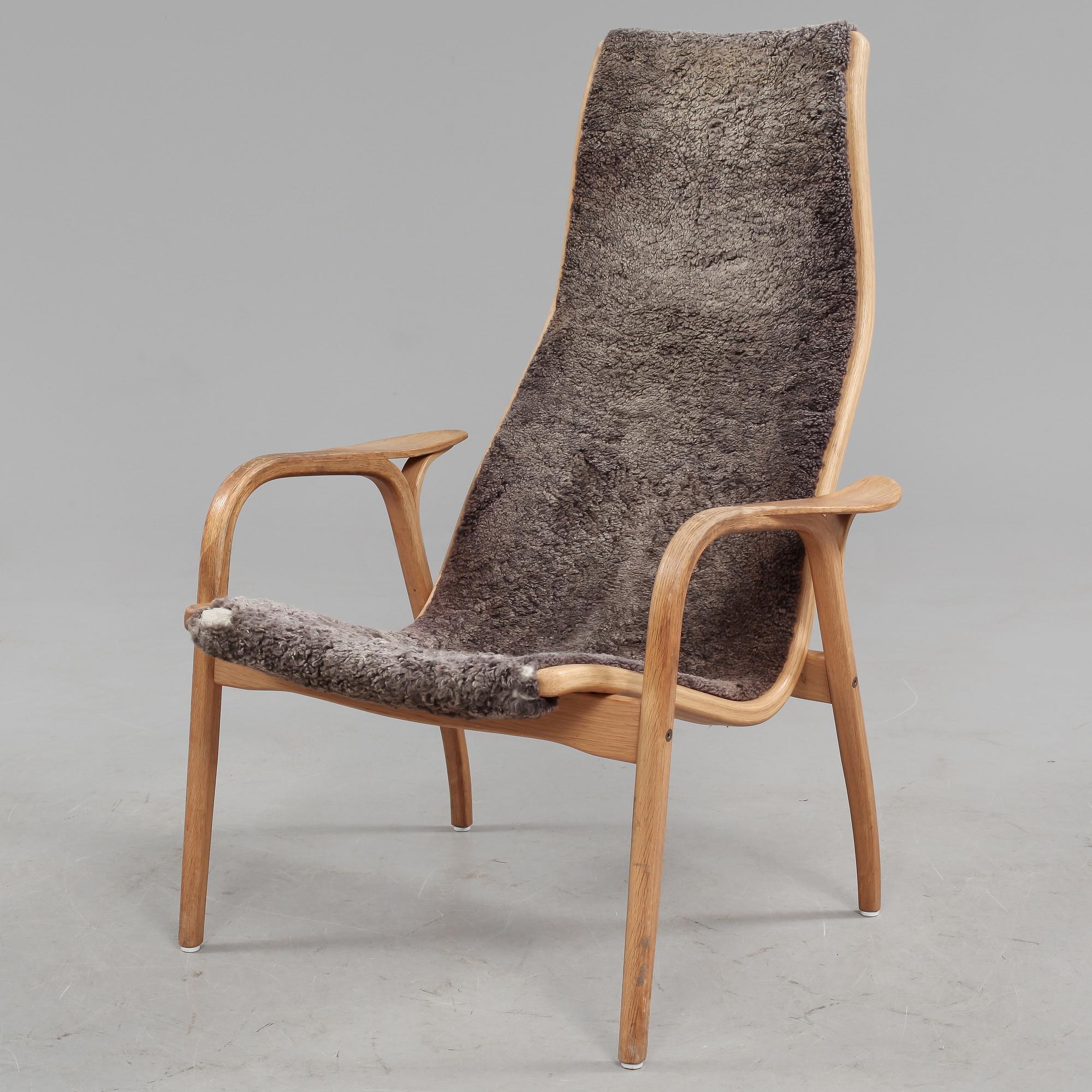 FÅTÖLJ samt FOTPALL, "Lamino", Yngve Ekström, Swedese, 1900-talets fjärde kvartal.