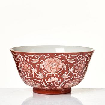 A coral red reverse decorated floral bowl, seal mark of Daoguang, Republic, 20th Century.