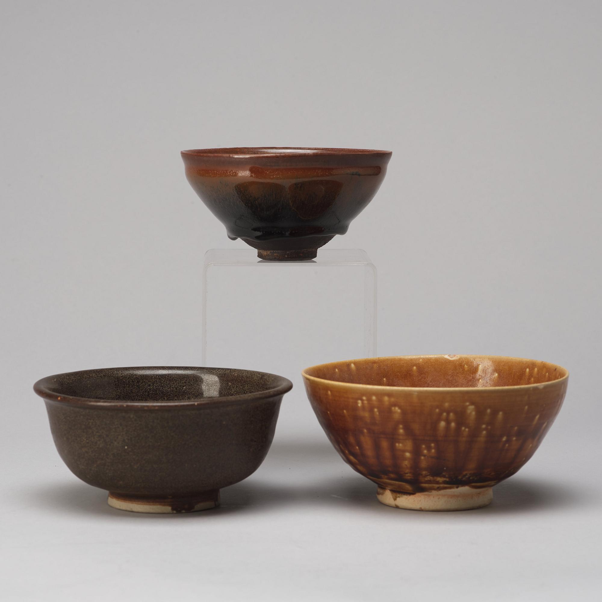 A group of three brown glazed bowls, China, 20th Century.