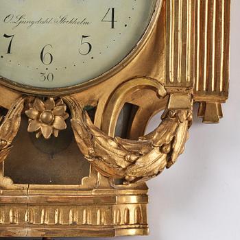 A Gustavian giltwood cartel clock by O. Ljundahl (watchmaker in Stockholm 1775-80).