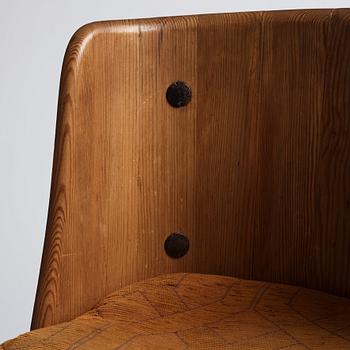 Axel Einar Hjorth, a pair of stained pine 'Lovö' chairs, Nordiska Kompaniet, Sweden 1930s.