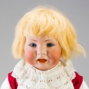 A bisque head character doll 116 by Kämmer & Reinhardt, Germany, 1911.