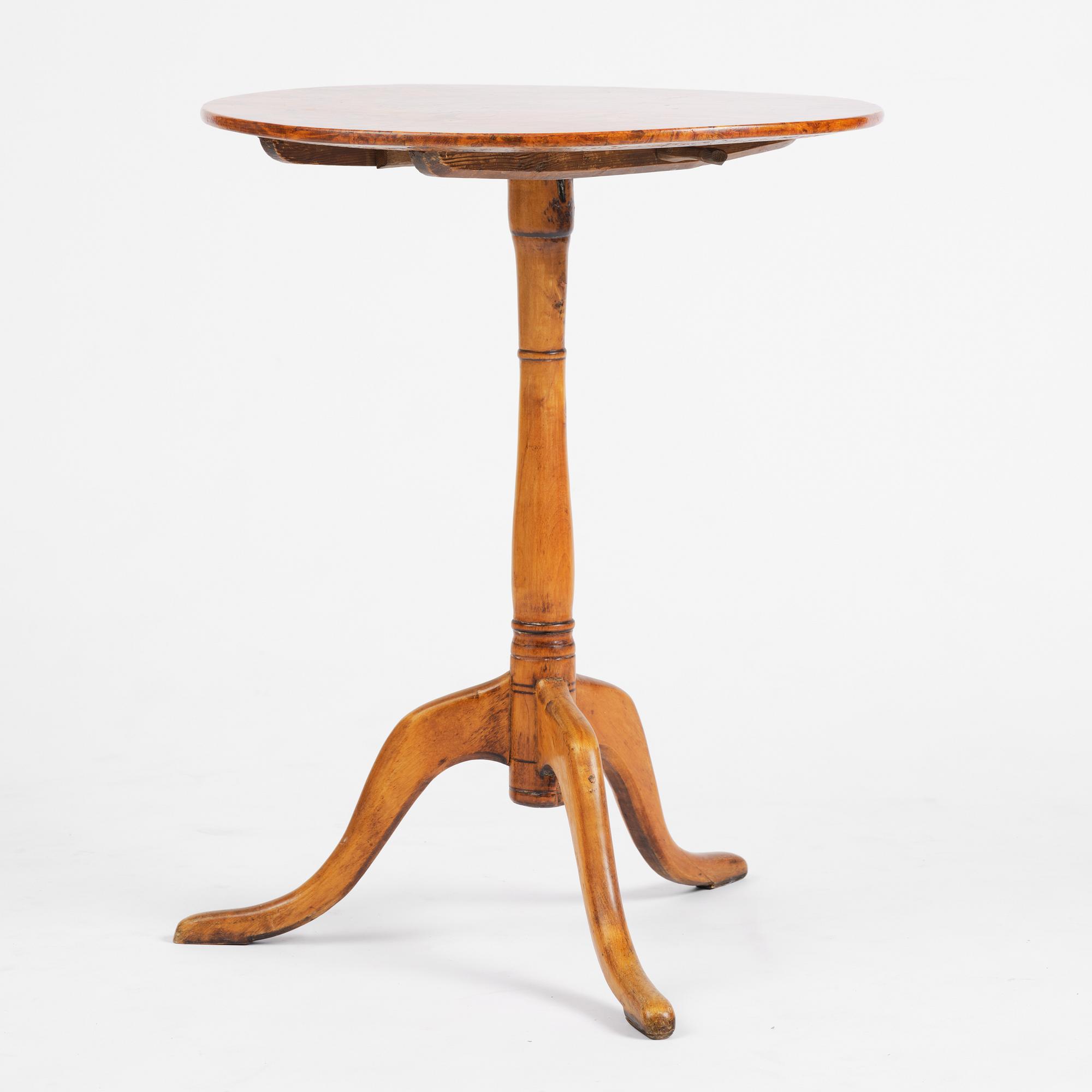 A tilt top table, from around the year 1800.