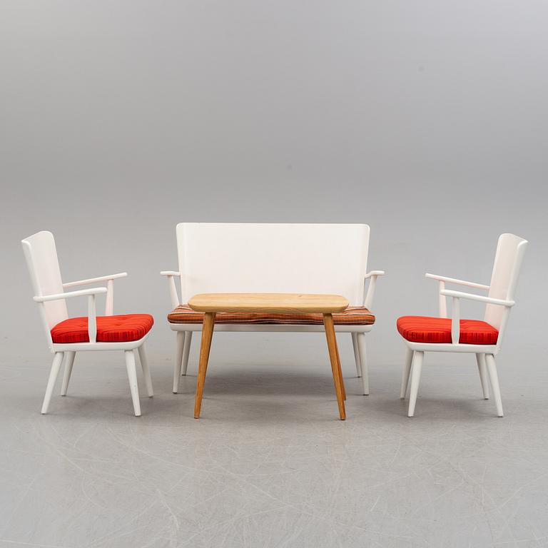 A second half of the 20th century sofa, pair of armchairs and coffee table by Göran Malmvall.