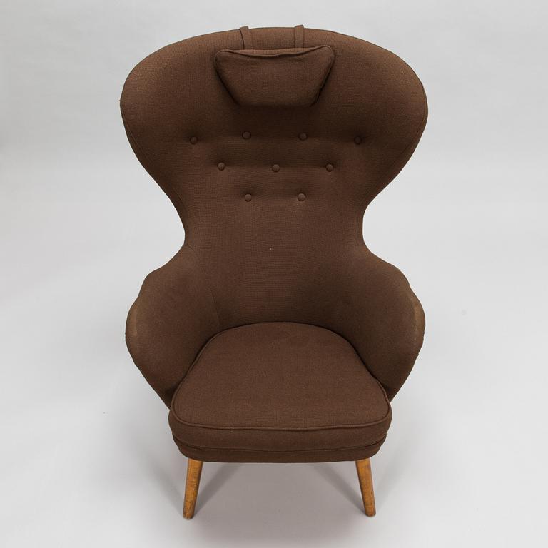 Carl Gustaf Hiort af Ornäs, A mid-20th-century armchair 'Siesta' manufacturer Puunveisto Oy - Träsnideri Ab, Finland.