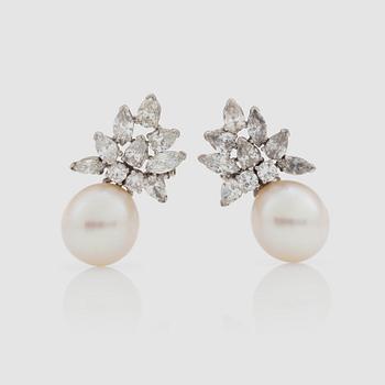 1166. A pair of Van Cleef and Arpels earrings with cultured South sea pearls and diamonds, total carat weight 3.30 ct.