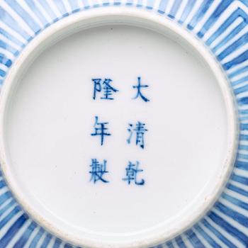 A blue and white Chinese bowl, presumably Republic, with Qianlong mark.