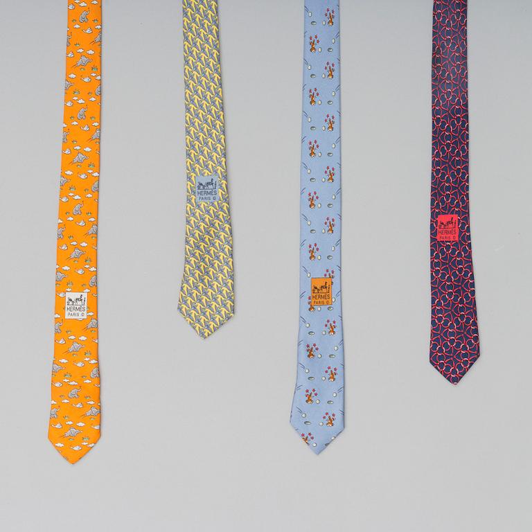 A set of four silk ties by Hermès.