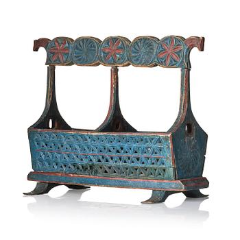 191. A Swedish folk art carved and painted bobin-holder, circa 1800.