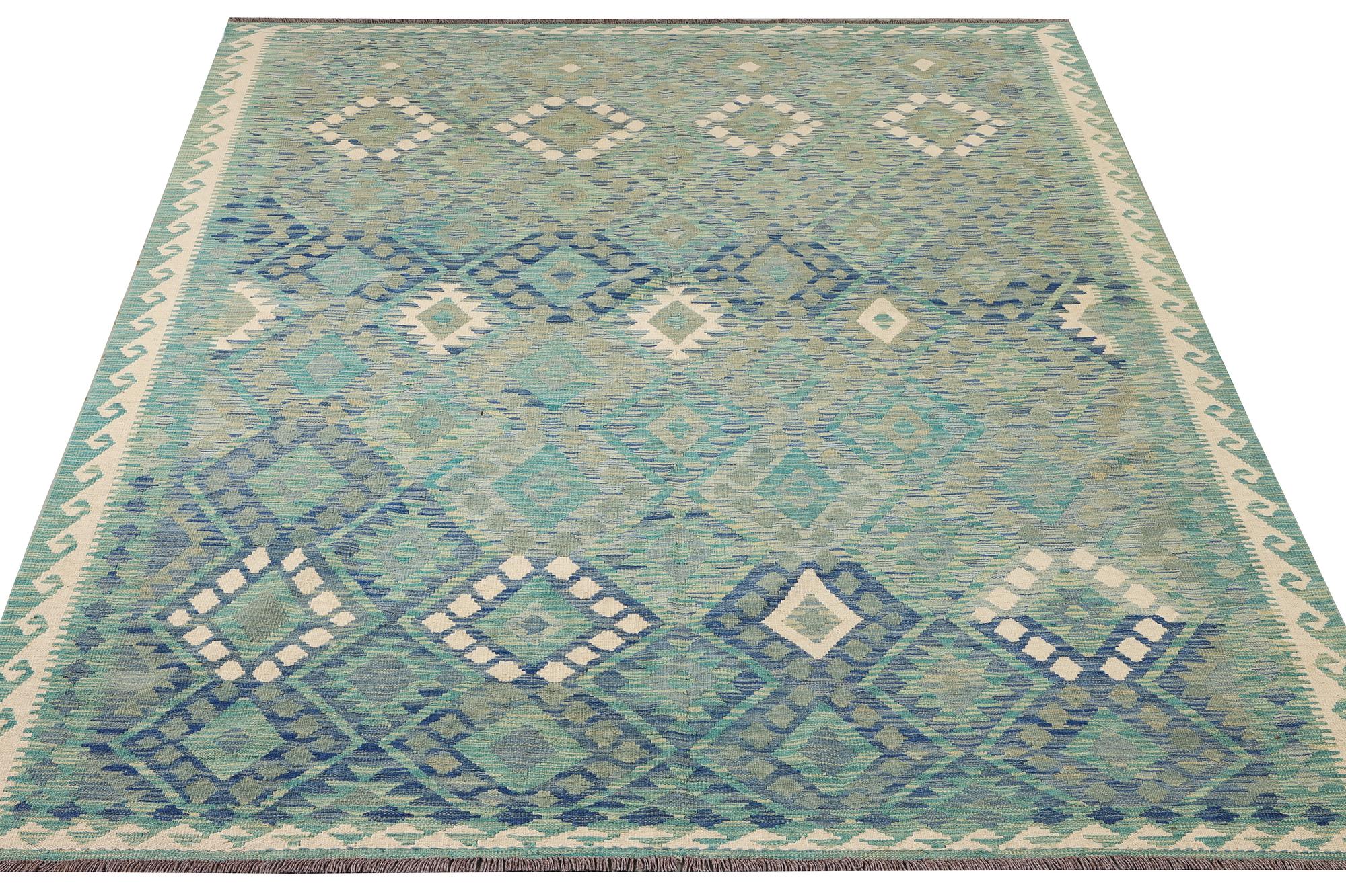 An Afghan kilim carpet, c. 299 x 213 cm.