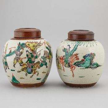 Two Chinese famille verte jars with wooden covers, first half of the 20th century.