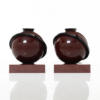 A pair of 'Saturnus' candleholders, 1930s.