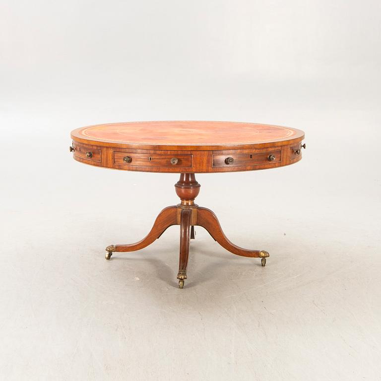 An English mahogany and leather drumtable mid 1900s.