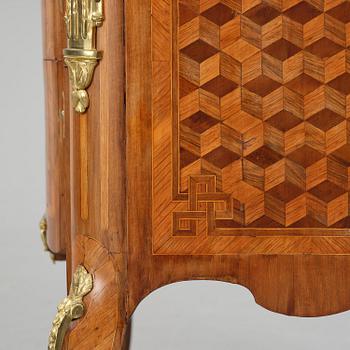 A Louis XVI rosewood and amaranth marquetry ormolu-mounted commode by Leonard Boudin (master in Paris 1761).