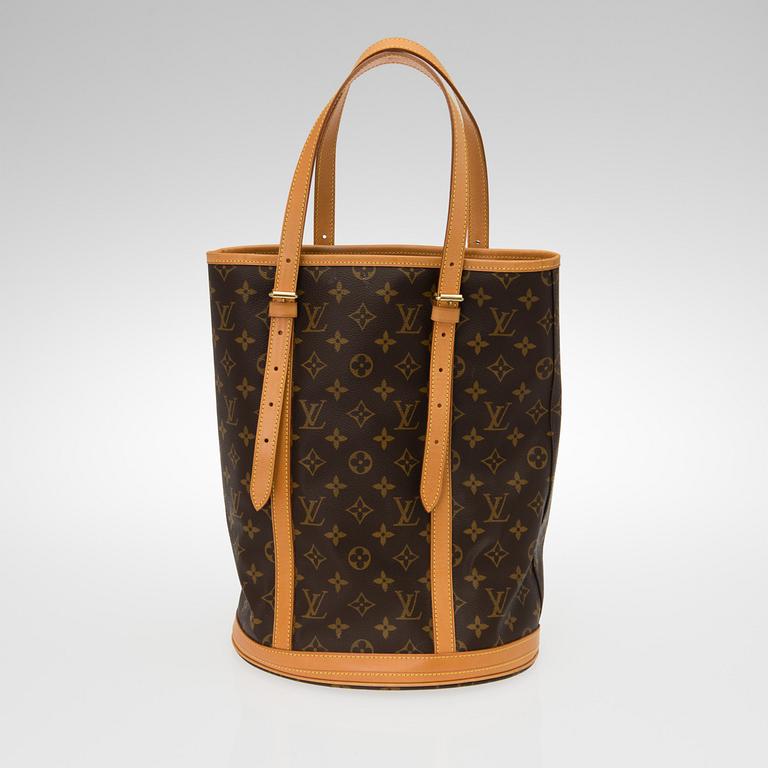 A MONOGRAM CANVAS BUCKET SHOULDER BAG WITH A POCHETTE.