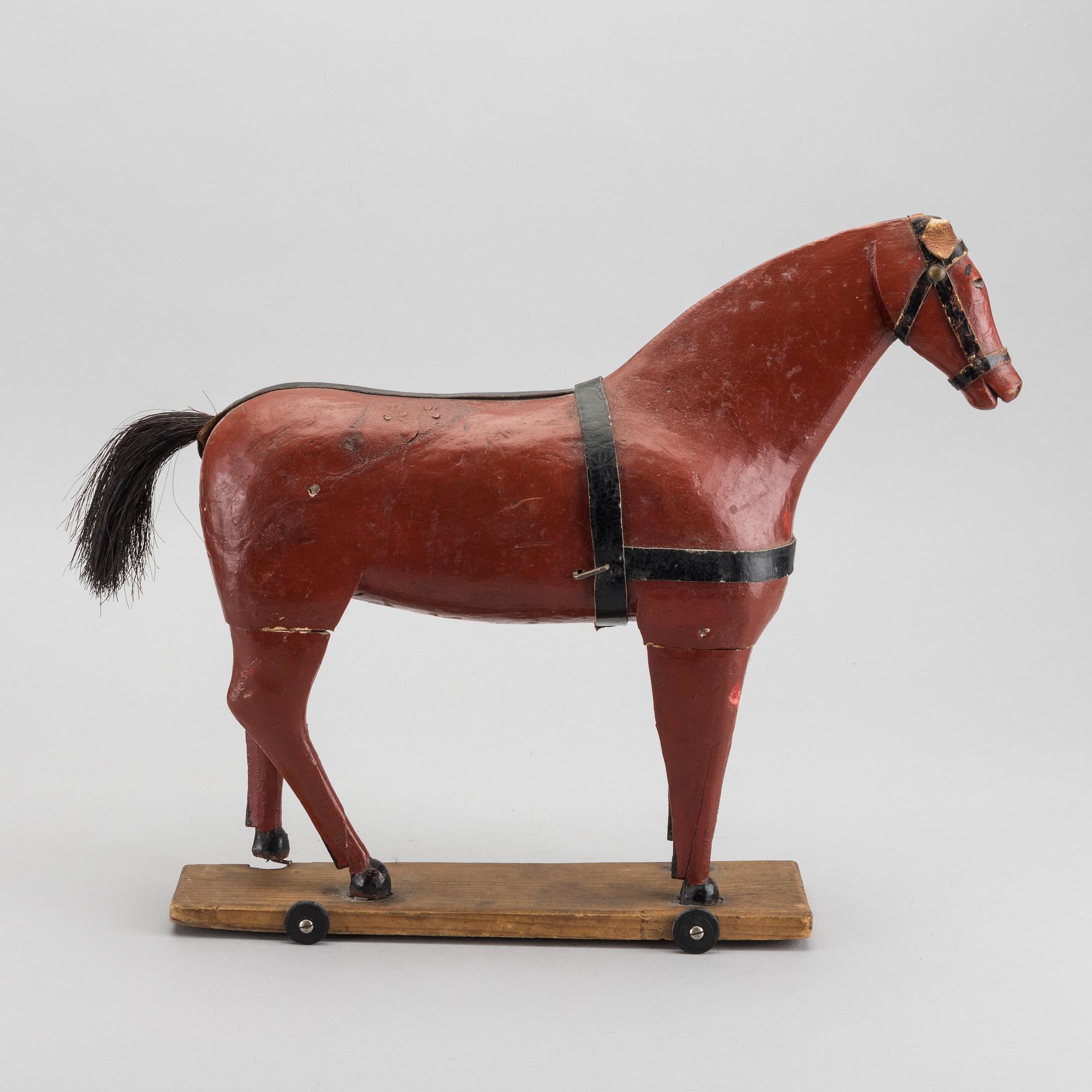 A toy wooden horse, late 19th cenury / turn of the century 1900.