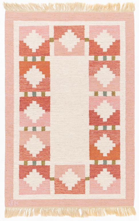 A flatweave carpet, signed JK, 210 x 140 cm.